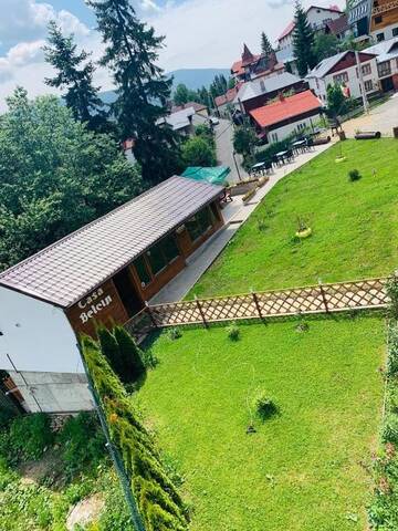 Фото номера Номер с кроватью размера «king-size» и видом на горы Гостевой дом Casa Belcin г. Буштени 8