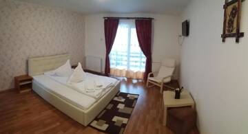 Фото номера Двухместный номер с 1 кроватью Гостевой дом Pensiunea Katalina 2 г. Буштени 6