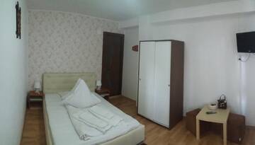 Фото номера Двухместный номер с 1 кроватью Гостевой дом Pensiunea Katalina 2 г. Буштени 4