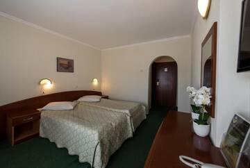 Фото номера Двухместный номер с 2 отдельными кроватями Отель Hotel Silva Busteni г. Буштени 10