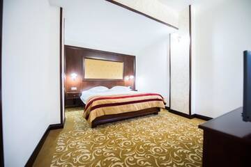 Фото номера Улучшенные апартаменты Дуплекс Отель Hotel Silva Busteni г. Буштени 2