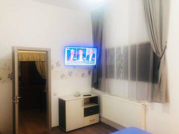 Фото номера Номер-студио Делюкс с кроватью размера &quot;king-size&quot; Гостевой дом Casa Dixi г. Буштени 5